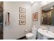 Modern powder room with elegant fixtures and marble accents at 435 S Tryon St # 907, Charlotte, NC 28202