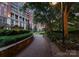 Beautiful building grounds with lush landscaping, brick pathways, and inviting atmosphere at 435 S Tryon St # 907, Charlotte, NC 28202