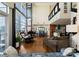 Stylish open floor plan featuring living, dining, and kitchen spaces with expansive city views at 435 S Tryon St # 907, Charlotte, NC 28202