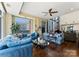 Bright living room with floor-to-ceiling windows and hardwood floors at 435 S Tryon St # 907, Charlotte, NC 28202