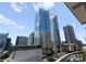 High-rise view, displaying modern architecture and cityscape under a clear sky at 435 S Tryon St # 907, Charlotte, NC 28202