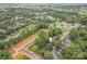 A beautiful neighborhood is displayed from above with a marker identifying the home at 4510 Wildwood Ave, Charlotte, NC 28208