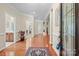 Elegant foyer with hardwood floors and natural light, creating a grand entrance to the home at 4527 Hubbard Falls Dr, Charlotte, NC 28269
