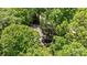 Aerial view of the home's roof surrounded by tall trees and lush greenery at 498 Glory Ct, Fort Mill, SC 29715