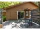 Relaxing backyard deck features a table setting and sliding glass doors to the home at 498 Glory Ct, Fort Mill, SC 29715
