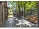 Deck features a dining and seating arrangement, offering a relaxing outdoor experience at 498 Glory Ct, Fort Mill, SC 29715