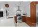 Well-equipped kitchen featuring stainless steel appliances, white countertops, and modern lighting at 498 Glory Ct, Fort Mill, SC 29715