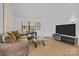 Bright living area featuring hardwood floors, neutral decor, and a cozy atmosphere at 498 Glory Ct, Fort Mill, SC 29715
