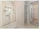 Modern bathroom features a glass-enclosed shower and access to walk-in closets at 5307 Ayers Orchard Way, Charlotte, NC 28227