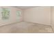 Spacious bedroom with multiple windows at 5307 Ayers Orchard Way, Charlotte, NC 28227