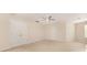 Neutral bedroom with a ceiling fan and double doored closet at 5307 Ayers Orchard Way, Charlotte, NC 28227