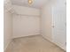 Functional walk-in closet with carpet, shelving, and a door for optimal storage and easy access at 5307 Ayers Orchard Way, Charlotte, NC 28227