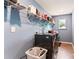 Well-lit laundry room with modern washer and dryer units and ample storage space at 6425 Pamela St, Huntersville, NC 28078