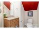 Powder room features wooden vanity with granite countertop, a mirror, and wall art at 704 Millstream Dr, Rock Hill, SC 29732