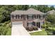Beautiful brick home with a two-car garage and a manicured front lawn at 704 Millstream Dr, Rock Hill, SC 29732