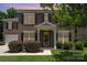 Inviting brick home exterior featuring a covered porch, black shutters, and landscaped shrubs at 704 Millstream Dr, Rock Hill, SC 29732
