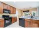 Functional kitchen featuring granite countertops and black appliances at 704 Millstream Dr, Rock Hill, SC 29732