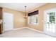 Bright breakfast nook with tile floors, natural light from windows and elegant light fixture at 704 Millstream Dr, Rock Hill, SC 29732
