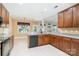 Well-equipped kitchen featuring granite countertops, cherry cabinets, and stainless steel appliances at 704 Millstream Dr, Rock Hill, SC 29732
