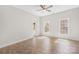Bright bedroom featuring tile floors, neutral paint, and an abundance of natural light at 716 W Graham St, Shelby, NC 28150