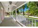 Charming front porch with white railings, providing a welcoming entrance to the home at 716 W Graham St, Shelby, NC 28150