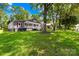 Charming home with a well-manicured lawn and mature trees in a desirable neighborhood at 716 W Graham St, Shelby, NC 28150