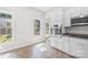 Bright kitchen featuring modern stainless steel appliances and ample natural light at 716 W Graham St, Shelby, NC 28150