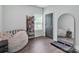 Inviting bedroom features a large mirror, modern decor, and a window letting in plenty of natural light at 720 4Th St, Stanley, NC 28164