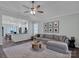 Bright and spacious living room open to the kitchen, perfect for entertaining at 720 4Th St, Stanley, NC 28164