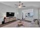 Bright and spacious living room open to the kitchen, perfect for entertaining at 720 4Th St, Stanley, NC 28164