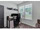 Modern office with plenty of natural light, a snowboard wall decor, and sleek desk setup at 720 4Th St, Stanley, NC 28164