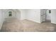 Neutral bonus room with carpeted floors and a small arched window, offering ample space at 7408 Mockingbird Ln, Waxhaw, NC 28173