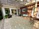 Charming outdoor patio with covered pergola, ample seating, and plants, offering a perfect spot for relaxing at 7408 Mockingbird Ln, Waxhaw, NC 28173