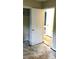 Bedroom with open closet door, white walls, and door leading to next room at 7705 Stone Canyon Ln, Charlotte, NC 28227