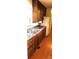 This kitchen is equipped with upper and lower cabinets, laminate counters and an appliance package at 7705 Stone Canyon Ln, Charlotte, NC 28227