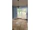 The living room has sliding glass doors that lead to an outdoor space, providing natural light at 7705 Stone Canyon Ln, Charlotte, NC 28227