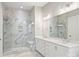 Bathroom featuring a glass shower, dual vanity, and marble floors at 822 River Oaks Ln, Charlotte, NC 28226