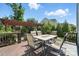 Lovely back deck with dining set and views of lush landscaping at 8427 Penton Pl, Harrisburg, NC 28075