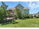 Large backyard boasts a deck, patio, and lush lawn at 8427 Penton Pl, Harrisburg, NC 28075