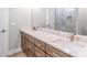 Bathroom featuring double sink vanity, hardwood floors, and glass enclosed shower at 1010 Oneil Dr, Monroe, NC 28112