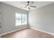 Bright bedroom with neutral walls and a large window bringing in natural light at 1010 Oneil Dr, Monroe, NC 28112