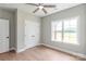 A bright bedroom with a window, closet and fan is well-lit by natural light at 1010 Oneil Dr, Monroe, NC 28112
