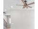 Modern ceiling fan with detailed lighting fixture in an open space featuring stairs at 1010 Oneil Dr, Monroe, NC 28112
