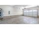Clean garage with door opener and concrete flooring at 1010 Oneil Dr, Monroe, NC 28112