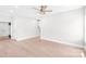 Open living room with bright walls, light colored floor and modern ceiling fan at 1010 Oneil Dr, Monroe, NC 28112