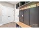 A mudroom featuring built-in storage with hooks and a bench, offering functionality at 1010 Oneil Dr, Monroe, NC 28112