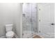 Modern bathroom with glass-enclosed shower and marble tiles at 1010 Oneil Dr, Monroe, NC 28112