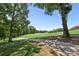 The golf course features well-manicured greens and beautiful landscaping, offering a picturesque setting at 10121 Edgecliff Rd, Huntersville, NC 28078
