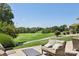 Enjoy serene golf course views from the patio, perfect for relaxing and entertaining guests at 10121 Edgecliff Rd, Huntersville, NC 28078