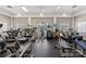 Well-equipped gym featuring modern cardio machines and weightlifting equipment for a complete workout at 10121 Edgecliff Rd, Huntersville, NC 28078